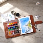 Fuumuui Watercolor Travel Set – 36-Color Travel Paint Kit with PU Leather Cover, 300gsm Cotton Paper, Double-Ended Travel Brush with Carbon Lead, Refillable Ring-Bound Design for Artists - Image 2